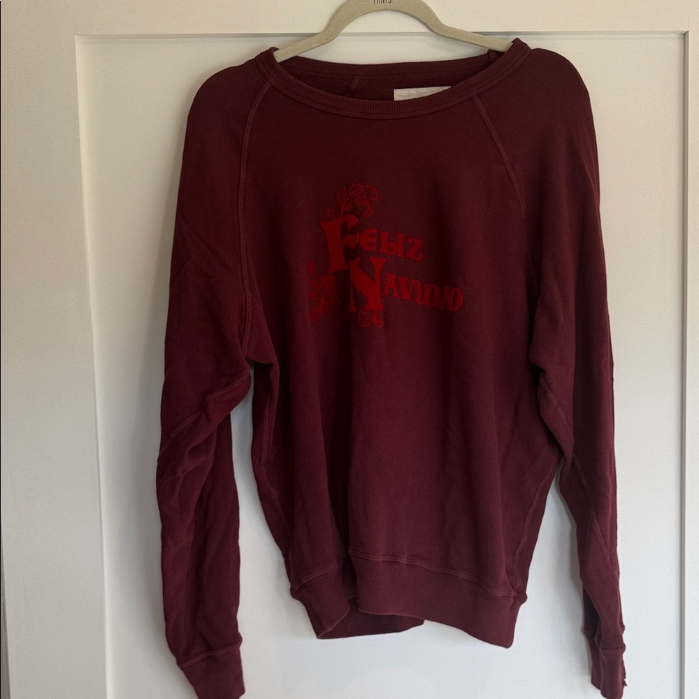 THE GREAT. Feliz navidad sweatshirt